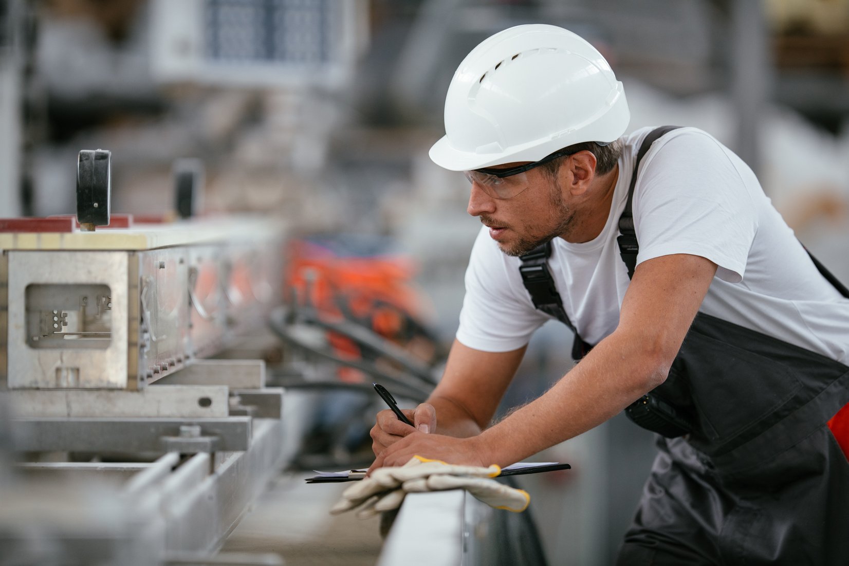 Factory worker controlling production line